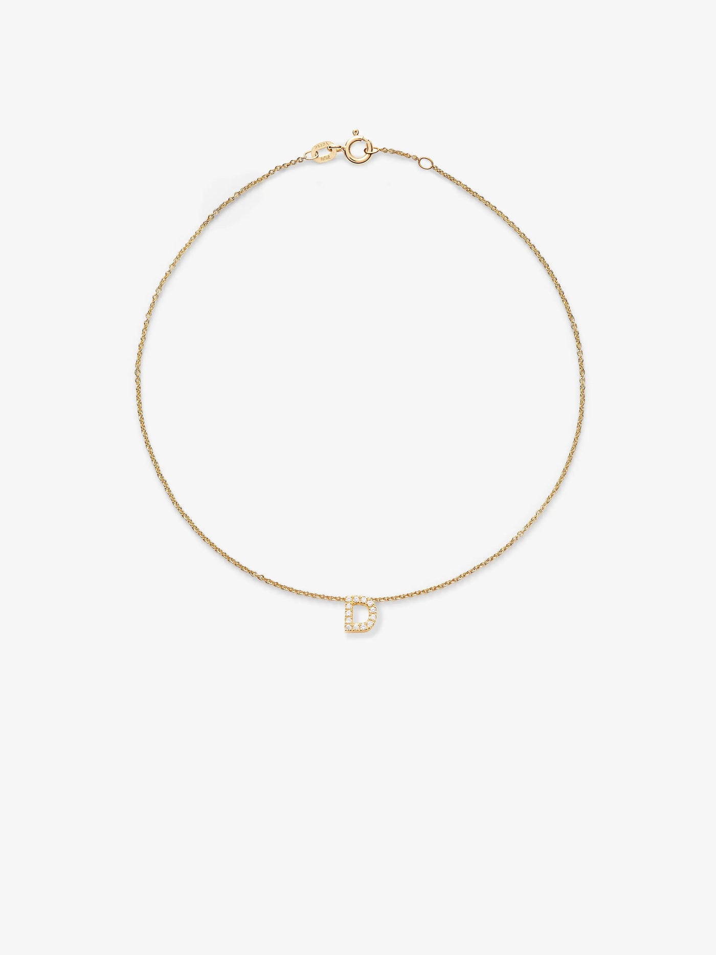 A delicate 18k solid gold bracelet featuring a pendant shaped like the letter "D," embellished with small, brilliant diamonds. The bracelet has a simple clasp and is photographed against a plain white background.