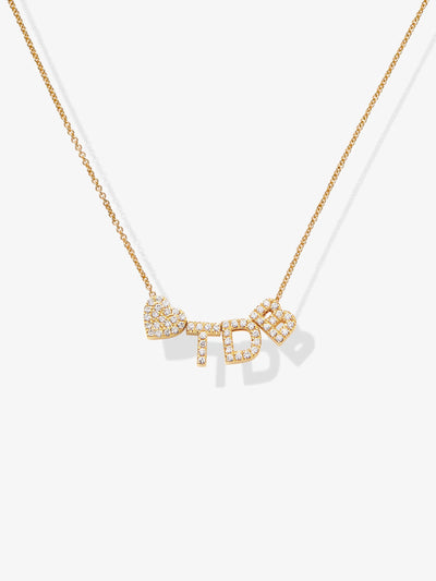 The Three Letters and Heart Necklace in Diamonds and 18k Gold showcases three diamond-encrusted letters, "T," "D," and "S," each arranged vertically and elegantly separated by two heart-shaped diamond charms. The 18k gold necklace is beautifully displayed on a plain white background.