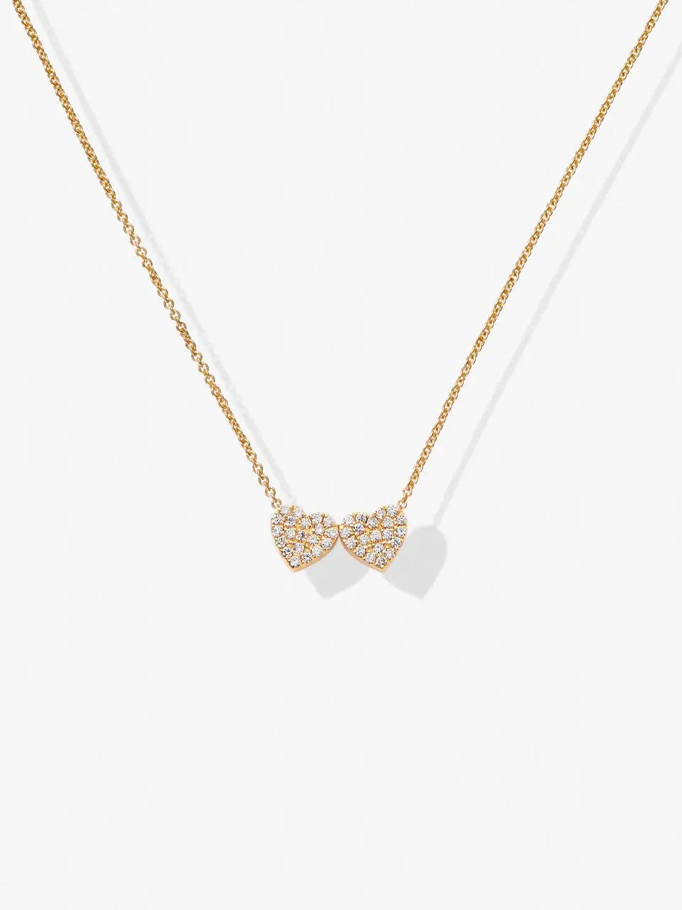 Two Diamond Hearts Necklace in 18k Gold versejewellery.com