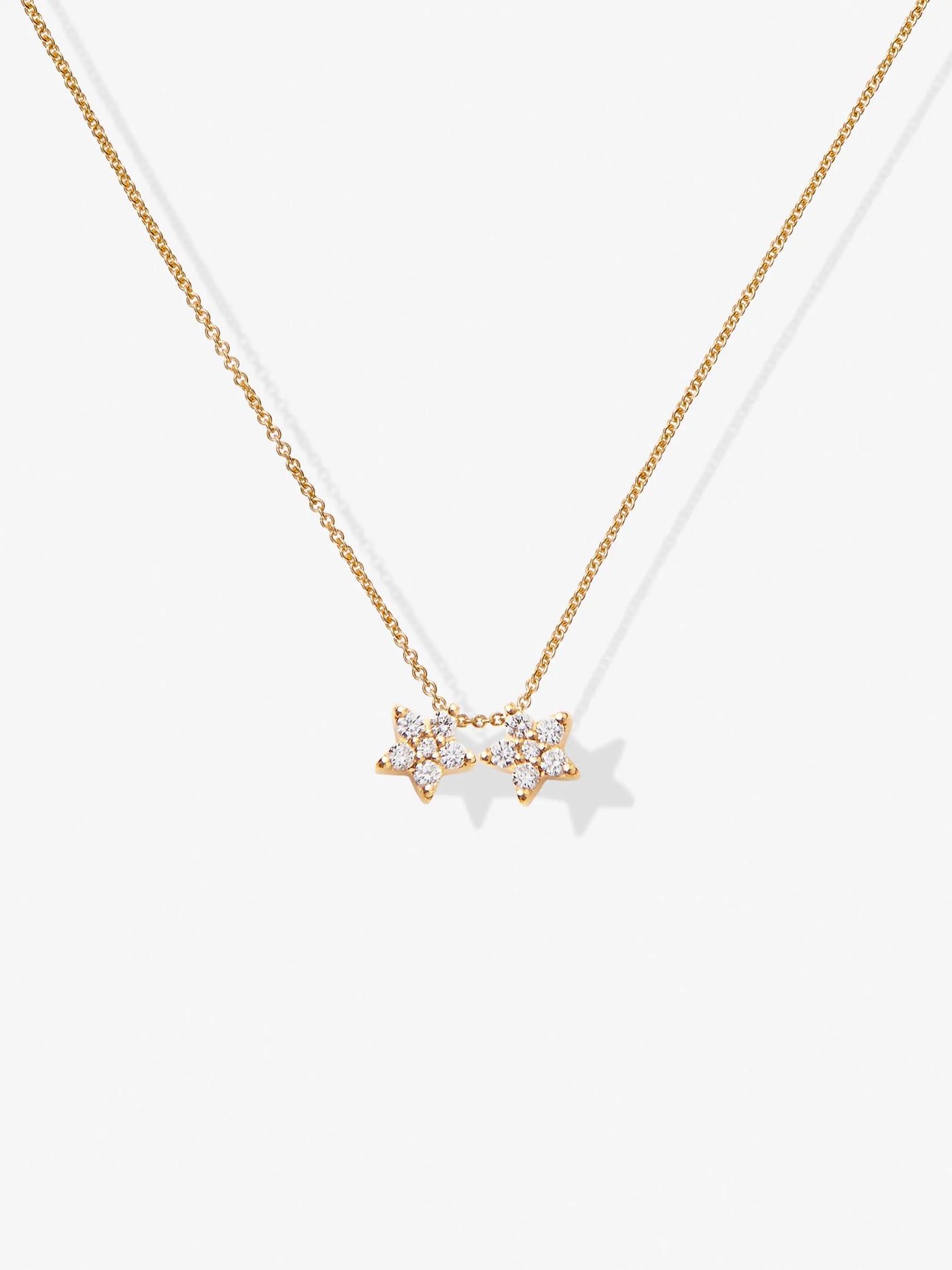 Two Diamond Stars Necklace in 18k Gold versejewellery.com