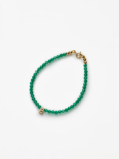 Hand-strung bracelet with natural green onyx gemstones and miniature three-dimensional diamond letter in 18k solid gold